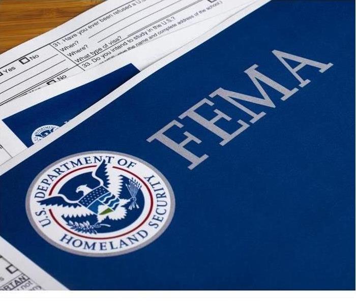 blue paper that says FEMA